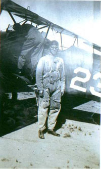 O. A. Labadie Jr. at March Field, CA in the late 1920s next to a Consolidated PT-3 Husky